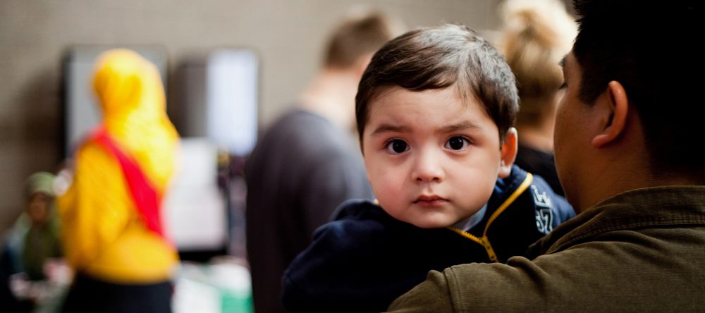 Boy with serious expression looking at camera.