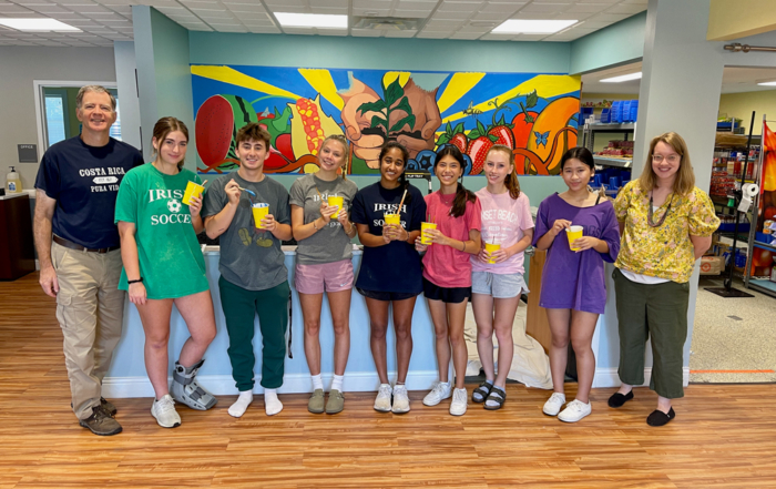 Rosemount High School students painted a mural at the Rosemount Resource Center and Food Shelf